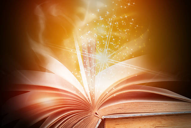 istock Abstract magic book on wooden background 513877478