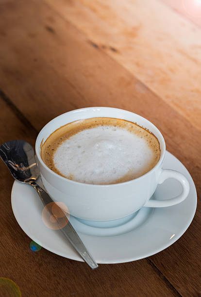 istock foam milk on hot latte coffee 513879342