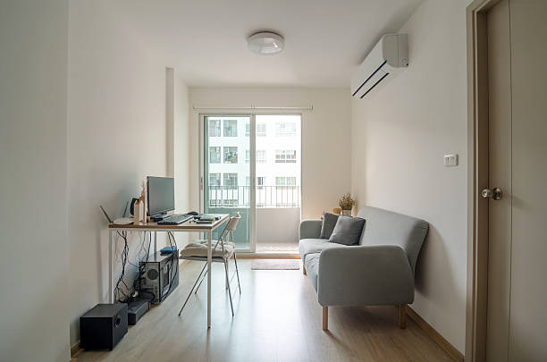istock Living room with working area in apartment 513879684