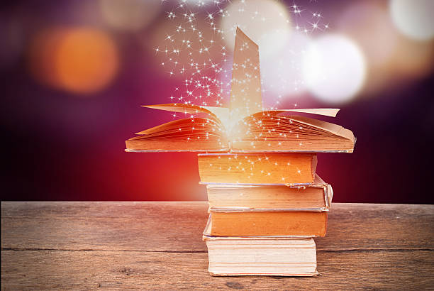 istock Abstract magic book on wooden background 513881144