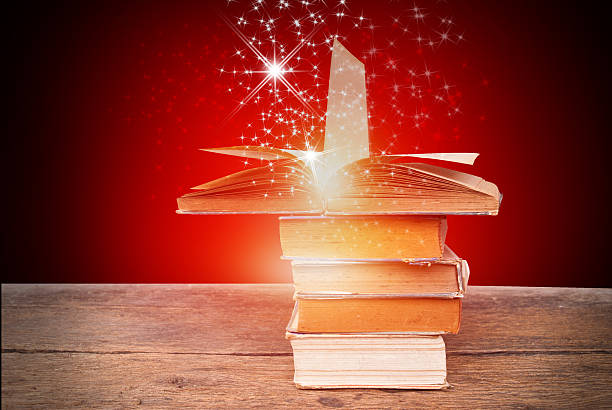 istock Abstract magic book on wooden background 513881168