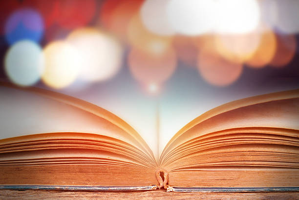 istock Abstract magic book on wooden background 513881224