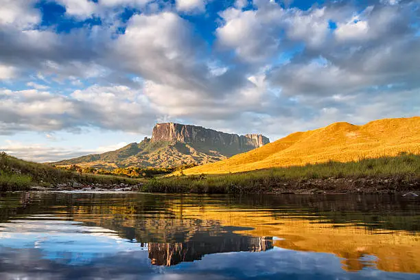 Tepuy Kukenan Tepuy from Tek river plain, Gran Sabana, Venezuela. The Kukenan and Roraima tepuys are the most visited and tourist places at the south of Venezuela, right at the borders with Brazil and Guyana.