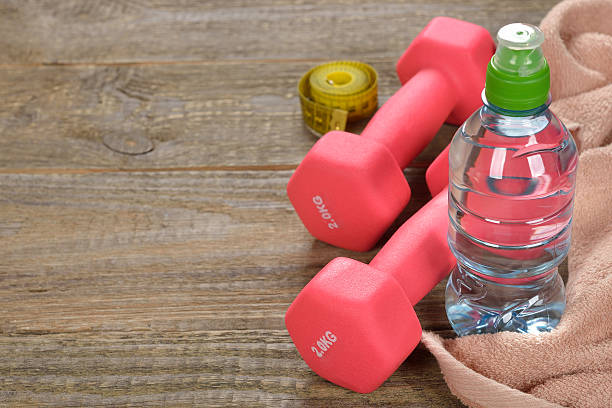 istock Dumbbell, water and towel 513881692