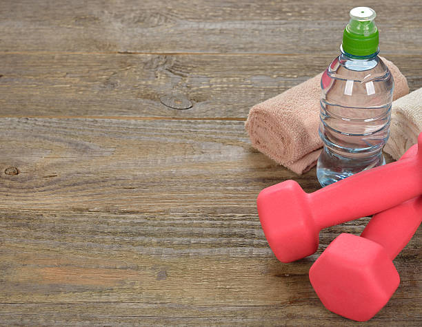 istock Dumbbell, water and towel 513881724