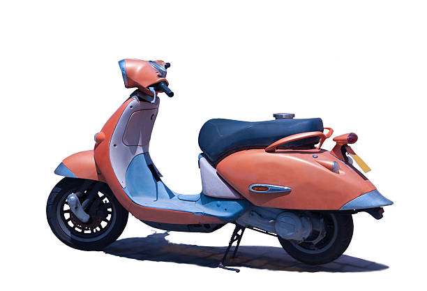 istock Charming old dusty orange vintage scooter Mediterranean style 513881923
