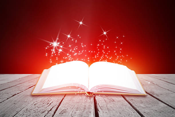 istock Abstract magic book on wooden background 513882162