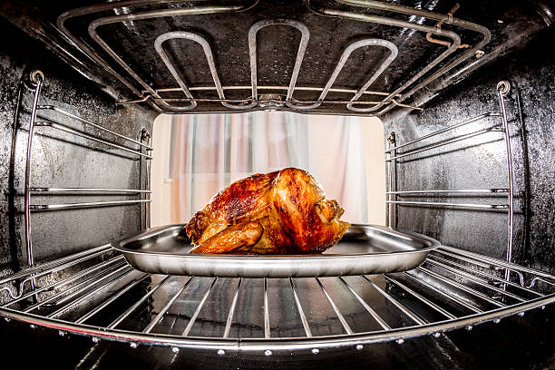 istock Roast chicken in the oven. 513883775