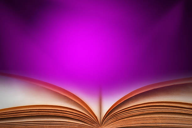 istock Abstract magic book on wooden background 513883988