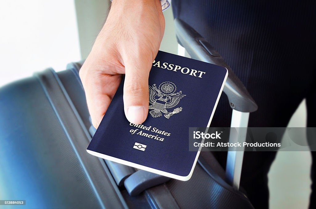 Hand holding U.S. passport Passport Stock Photo