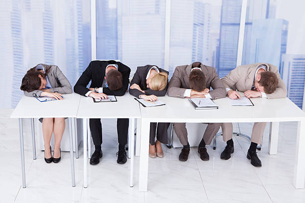 istock Tired Corporate Personnel Officers At Table 513886701
