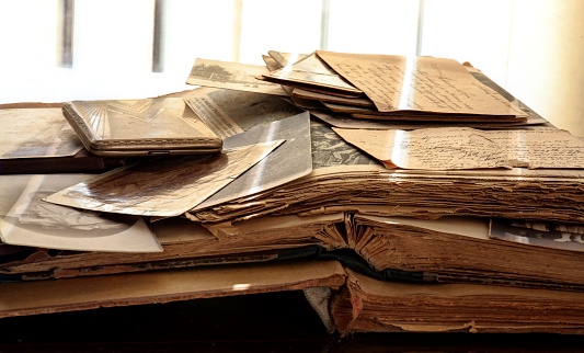 Old books, newspapers, photos and letters.