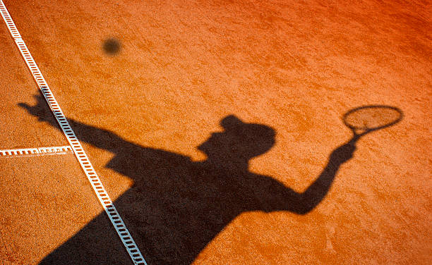 Clay tennis court and player concept Clay tennis court and player concept clay court stock pictures, royalty-free photos & images