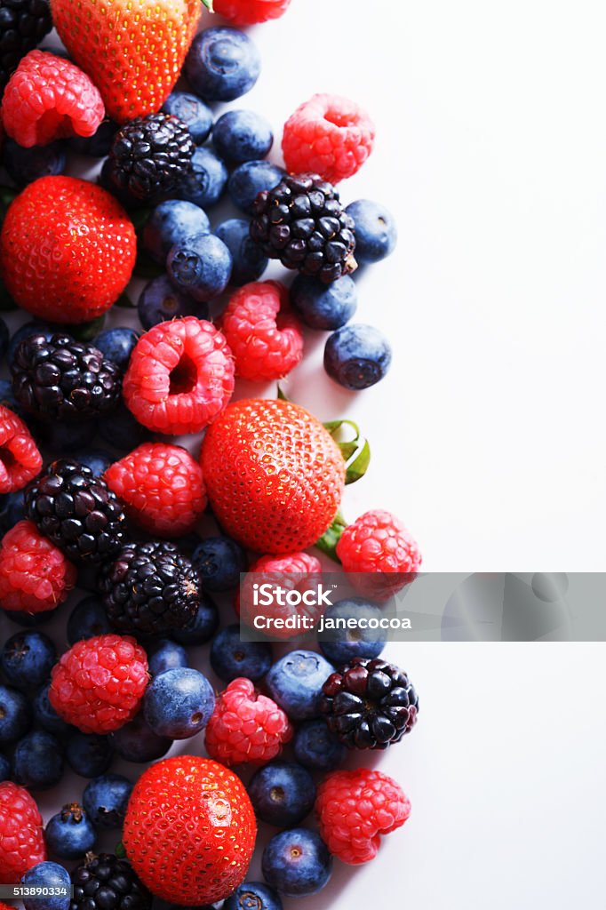 strawberries, blueberries, raspberries and black berries. strawberries, blueberries, raspberries and black berries. fresh berries on white background Blackberry - Fruit Stock Photo