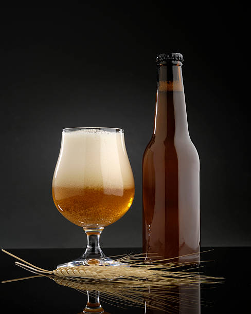 istock craft beer glass with bottle 513891096