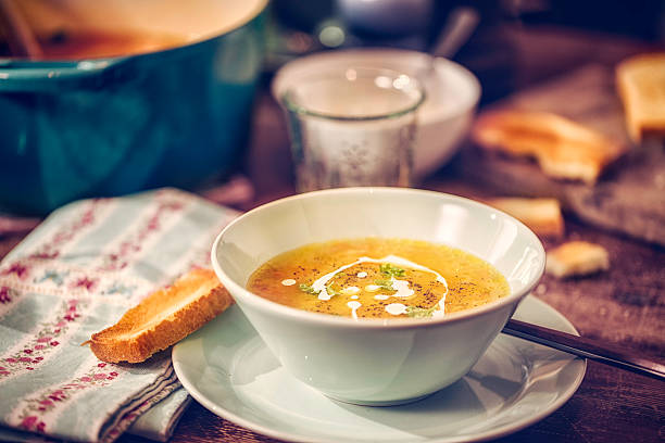 istock Delicous Chicken Soup with Carrots and Parsnips 513891904