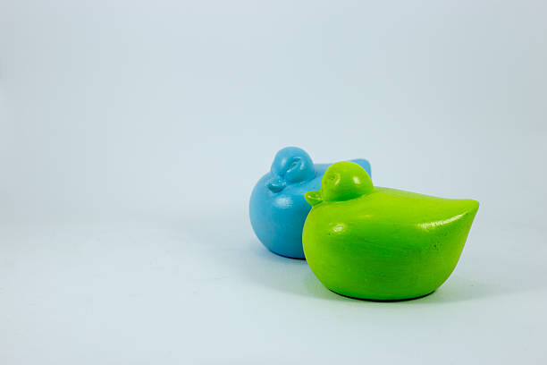 istock wooden toy duck with white background 513892544