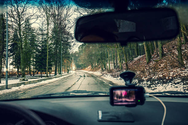 istock driving a car in stormy weather 513894016