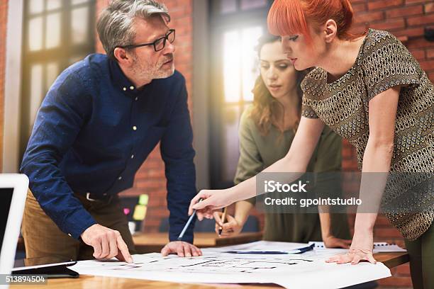 Working With Young And Creative People Stock Photo - Download Image Now - Business Meeting, Casual Clothing, Leaning