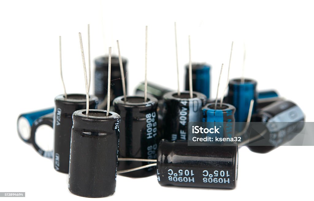 capacitors are isolated capacitors are isolated on a white background Business Finance and Industry Stock Photo