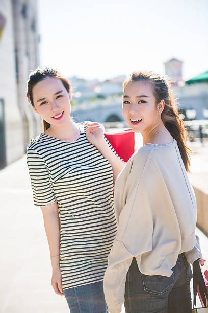 istock Two young women in shopping 513894876