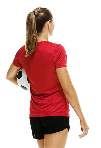 istock Rear view of soccer player holding ball 513902373