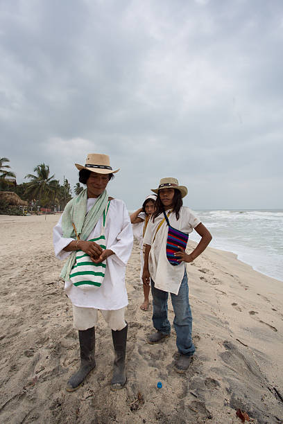 Wayuu familly posing on the beach in Colombia stock photo