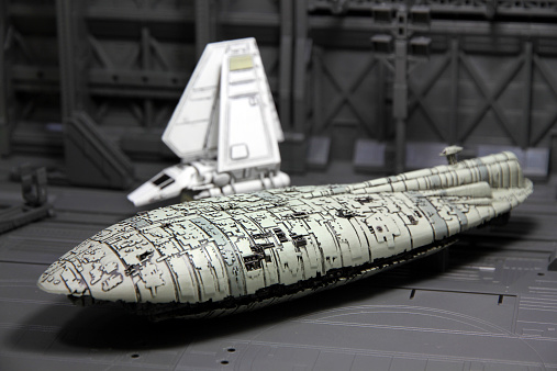 Vancouver, Canada - July 30, 2014: Models of an Imperial Shuttle and the Gallofree medium transport rest in a recreation of the Hanger Bay of Home One, the flagship of the rebel fleet at the battle of Endor. The models are made by made for the X-Wing miniature game for Fantasy Flight Games.
