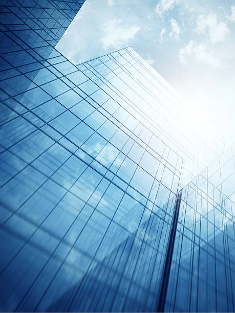 istock Skyscraper's exterior with blue glass walls 513906783