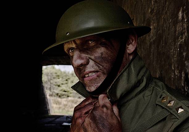 istock soldier leaning against a wall of a bunker 513908433