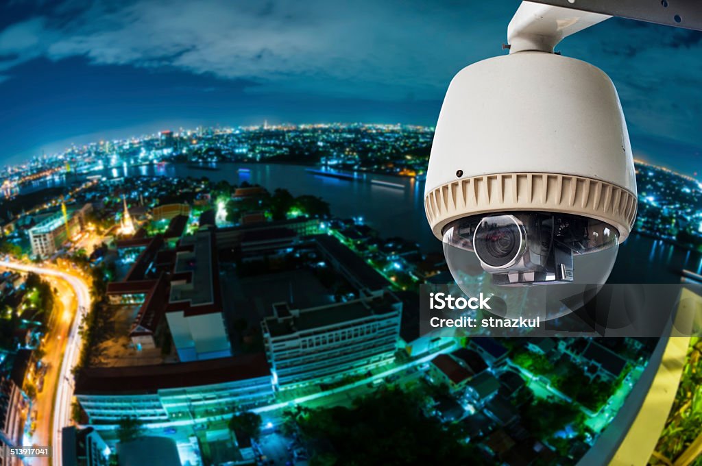 CCTV with Blur City in background fish eye perspective Above Stock Photo