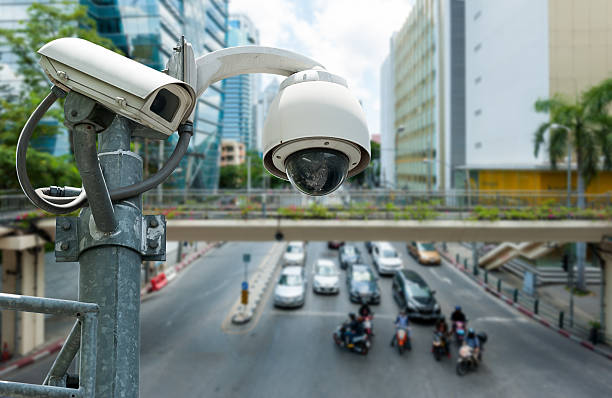istock CCTV camera or surveillance operating on traffic road 513917181