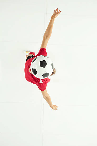 istock Female soccer player heading the ball 513918609