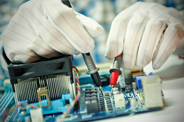 istock Man fixing mother board 513918701