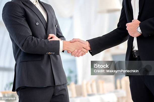 Transaction Business Two Successful And Confident Businessman T Stock Photo - Download Image Now