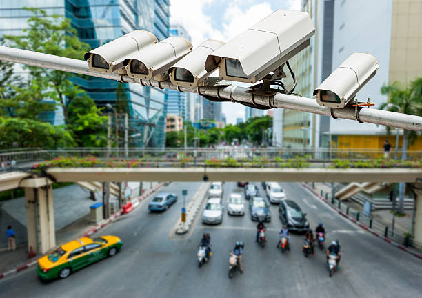 istock CCTV camera or surveillance operating on traffic road 513920445