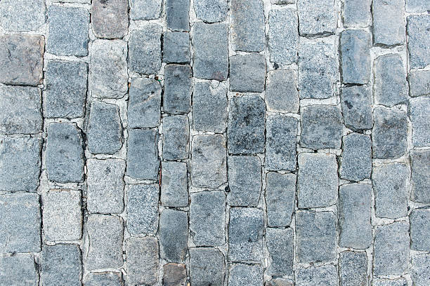 kopfsteinpflaster hintergrund - paving stone cobblestone road old stock-fotos und bilder