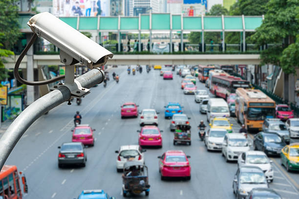 istock CCTV camera or surveillance operating on traffic road 513920633