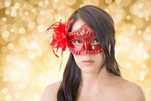 istock woman in a carnival mask 513922093