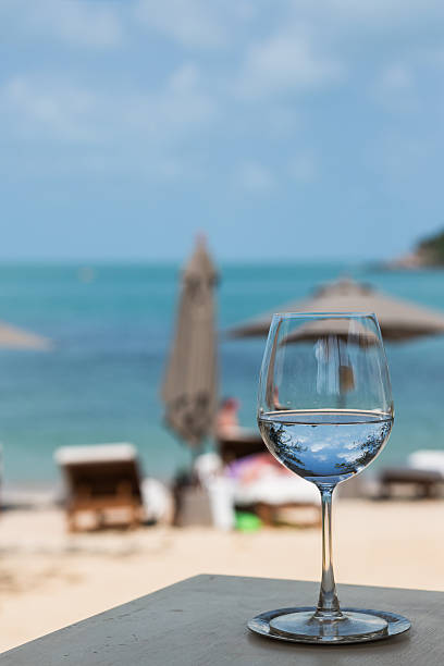 istock Beach restaursnt srving with glasses and plates 513931642