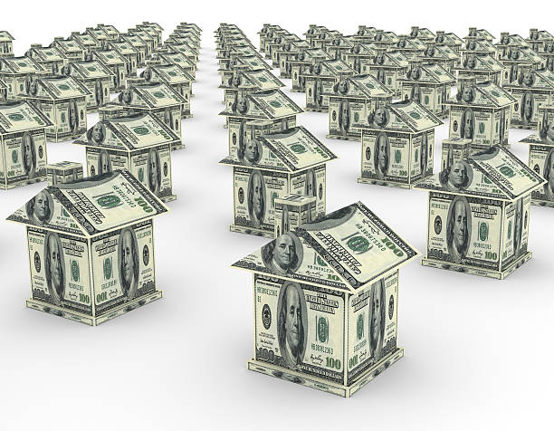 istock 3d houses from the money dollar 513932504