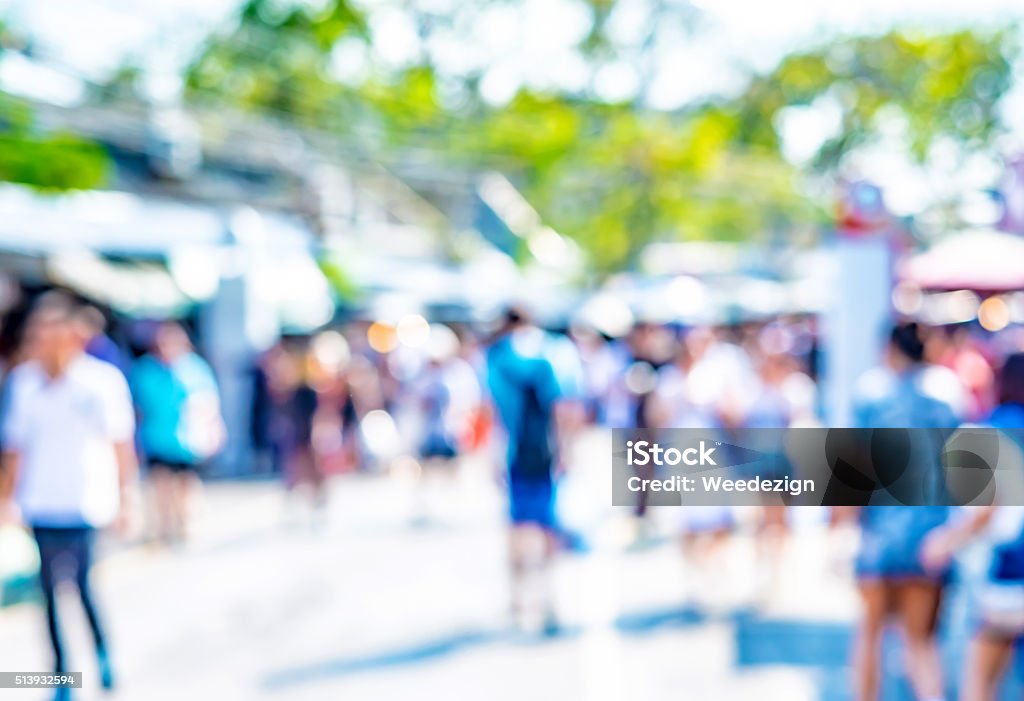 Blurred background : people shopping at market fair in day Blurred background : people shopping at market fair in sunny day, blur background with bokeh. Community Stock Photo