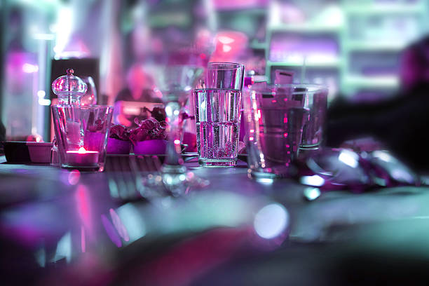 istock Purple Light Defocus Background Drinking Glasses Table Of Party 513932638
