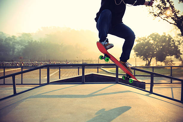 istock young skateboarder  skateboarding at skatepark 513932742