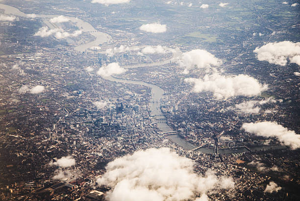 London from above A view of the Thames river at London, from above the clouds. waterloo bridge stock pictures, royalty-free photos & images