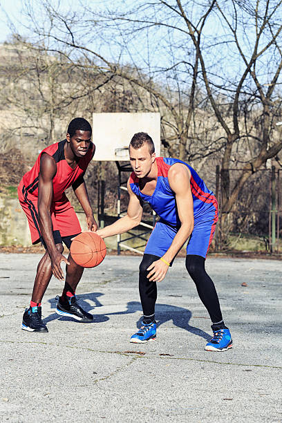 istock Basketball player failed to block the opponent with a ball 513939132