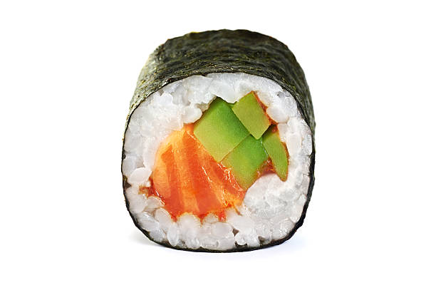 Sushi rolls with avocado, salmon and spicy sauce.