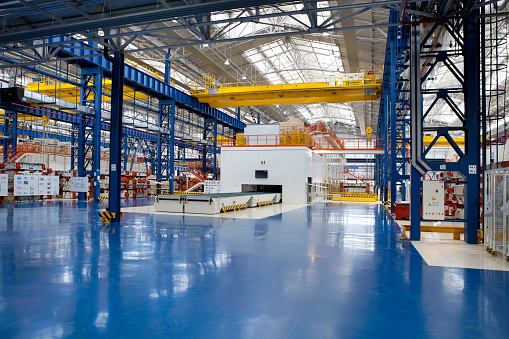 Kragujevac, SU, Serbia - September 23, 2012: industrial building interior at cars factory, the photo was taken at FIAT car factory during the open day and presentation of a new land vehicle model FIAT 500L