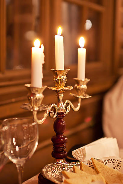 istock The burning candles in a candlestick on a  table 513943284