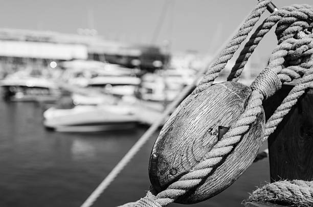 istock Blocks and rigging at the old sailboat, close-up 513943730